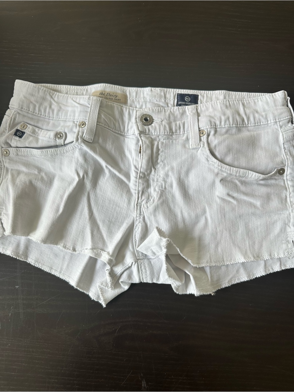 AG Adriano Goldschmied White Denim Cutoff Shorts with Frayed Hem